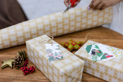 wrapping gifts with plantable toucan gift tags from purple & pure, plantable gifts ideas