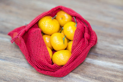 oranges for cny inside the exquisite red mesh produce bags