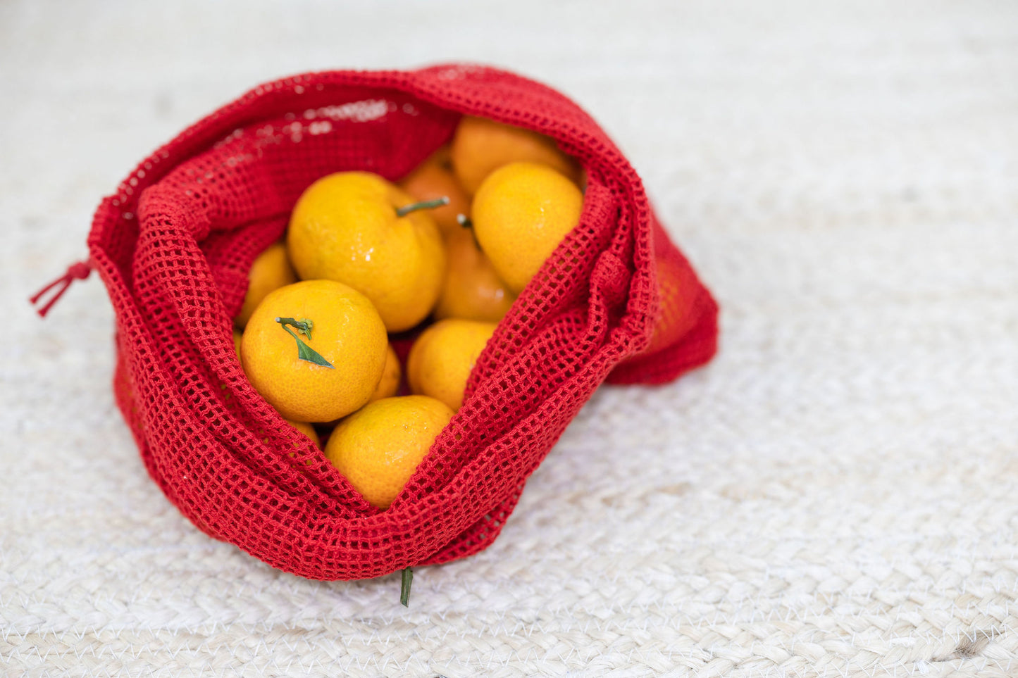 oranges for cny inside the exquisite red mesh produce bags