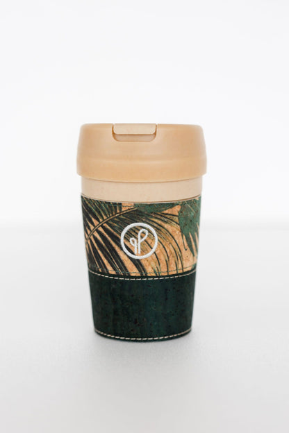 a dark green innovative eco-friendly sip cup from purple & pure