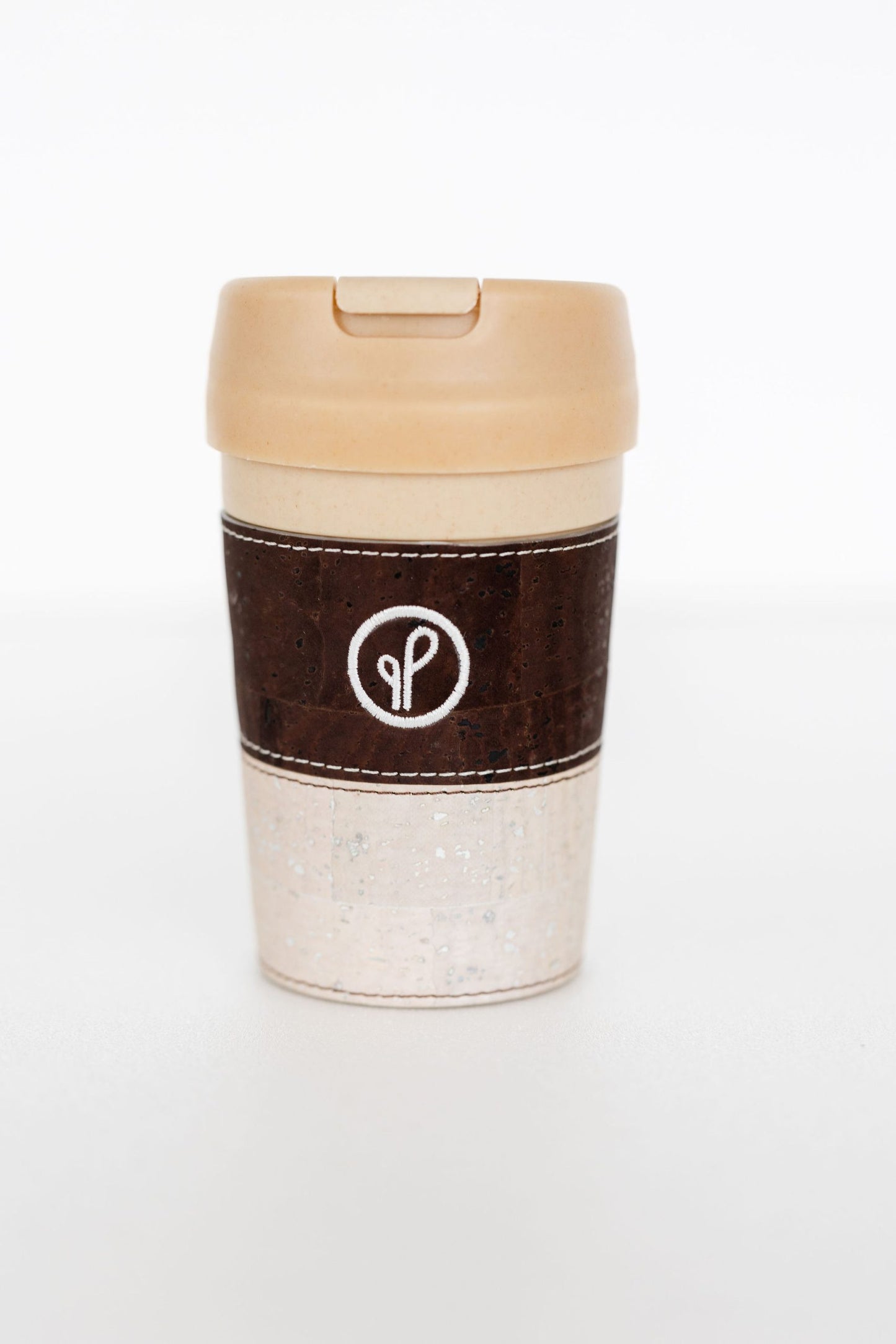 a brown innovative eco-friendly sip cup from purple & pure