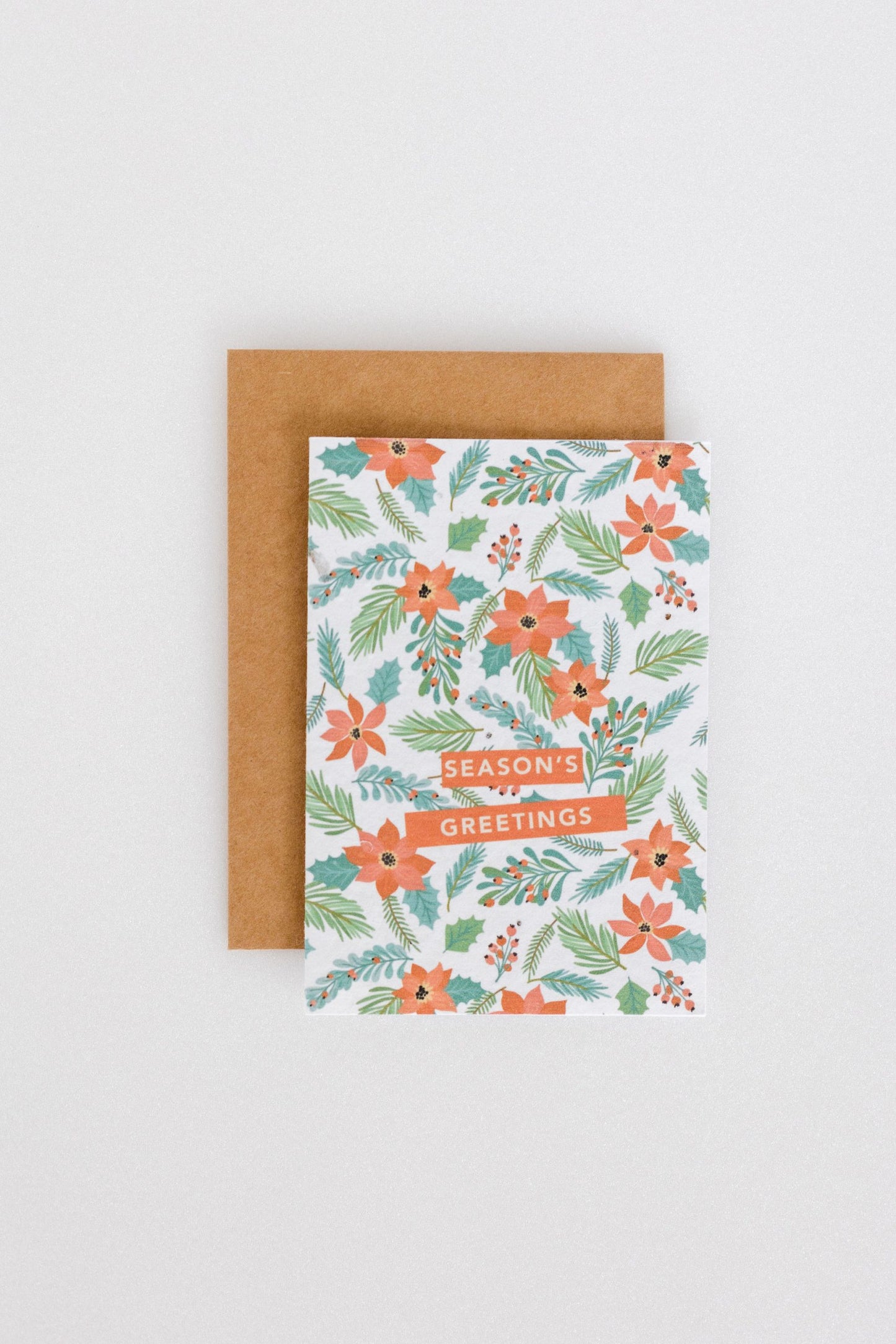 plantable plantable christmas greetings for holiday season with flower design