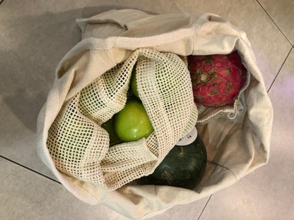 porple & pure organic cotton foldable tote bag containinng fruits